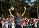 AUGUSTA, GEORGIA - APRIL 10: Scottie Scheffler celebrates on the 18th green after winning the Masters at Augusta National Golf Club on April 10, 2022 in Augusta, Georgia. (Photo by Jamie Squire/Getty Images)