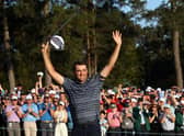 AUGUSTA, GEORGIA - APRIL 10: Scottie Scheffler celebrates on the 18th green after winning the Masters at Augusta National Golf Club on April 10, 2022 in Augusta, Georgia. (Photo by Jamie Squire/Getty Images)