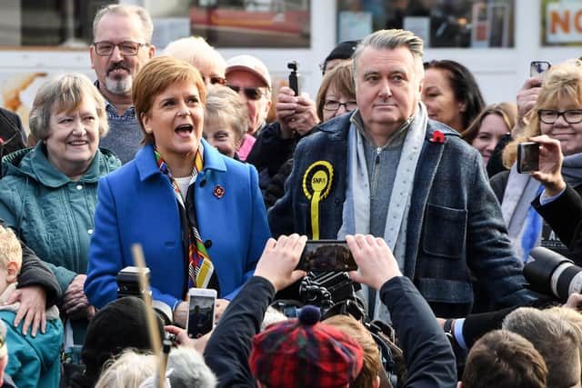 First Minister Nicola Sturgeon campaigns with then Ochil & South Perthshire candidate John Nicolson, now MP, in Alloa in November 2019 at the start of the General Election campaign. (Photo by ANDY BUCHANAN/AFP via Getty Images)