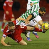 berdeen's Lewis Ferguson  battles with Celtic's Cameron Carter Vickers in the Pittdorie side's 3-2 defeat he believes came with a third visitors's goal that should not have stood and the failure of referee Willie Collum to award him a penalty late on.  (Photo by Craig Williamson / SNS Group)