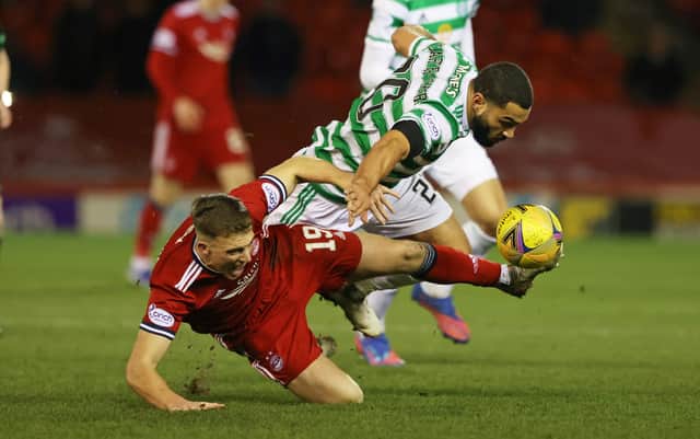 berdeen's Lewis Ferguson battles with Celtic's Cameron Carter Vickers in the Pittdorie side's 3-2 defeat he believes came with a third visitors's goal that should not have stood and the failure of referee Willie Collum to award him a penalty late on. (Photo by Craig Williamson / SNS Group)