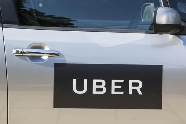 Uber drivers in the UK are to get a guaranteed minimum wage, holiday pay and pensions.