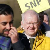 SNP MSP John Mason looks on at First Minister Humza Yousaf as the campaign at the Lord Roberts Monument in Kelvingrove Park, Glasgow. Photo: Andrew Milligan/PA Wire