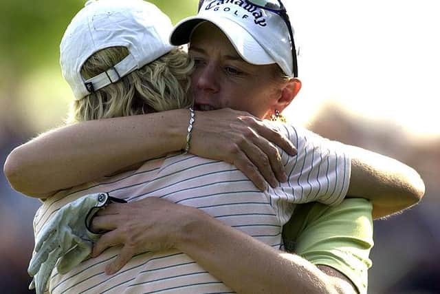 Annika Sorenstam hugs playing partner Mhairi McKay after finishing the final hole of the 2003 Kellogg-Keebler Classic at Stonebridge Country Club in Aurora Illinois. Picture: Jonathan Daniel/Getty Images.