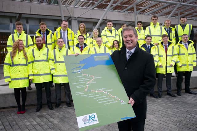 The then Infrastructure Secretary Keith Brown in 2014 showing the 11 A9 sections to be dualled. Picture: Jane Barlow