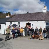 Members of the Knoydart Foundation outside the community pub (Knoydart Foundation)