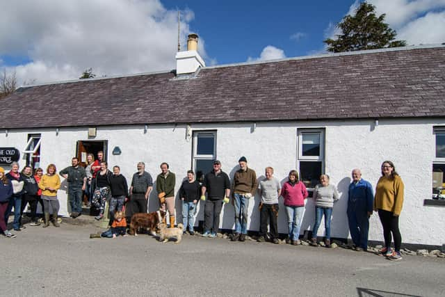 Members of the Knoydart Foundation outside the community pub (Knoydart Foundation)