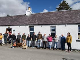 Members of the Knoydart Foundation outside the community pub (Knoydart Foundation)