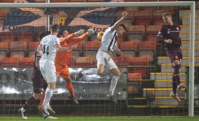 Dunfermline's Euan Murray scores to make it 2-0 against Hearts.