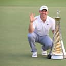 Rory McIlroy of Northern Ireland poses with the Race to Dubai trophy on the 18th green on the Earth Course at Jumeirah Golf Estates in Dubai. Picture: Ross Kinnaird/Getty Images.
