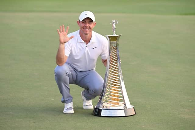 Rory McIlroy of Northern Ireland poses with the Race to Dubai trophy on the 18th green on the Earth Course at Jumeirah Golf Estates in Dubai. Picture: Ross Kinnaird/Getty Images.