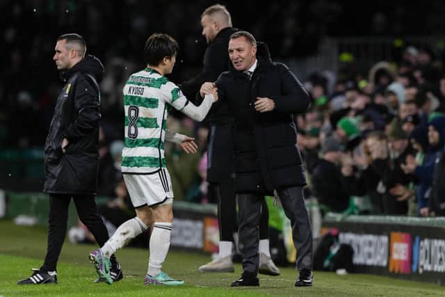 Kyogo Furuhashi is warmly embraced by his Celtic manager Brendan Rodgers after scoring the opener in a 2-0 win over Livingston.