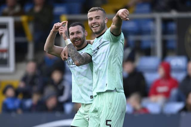 Hibs' Martin Boyle celebrates with Ryan Porteous after making it 2-0 in the win over Ross County. (Photo by Rob Casey / SNS Group)