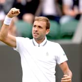 Dan Evans celebrates after winning his gentlemen's singles match against Feliciano Lopez on court 2 on day two of Wimbledon. Picture: Steven Paston/PA Wire