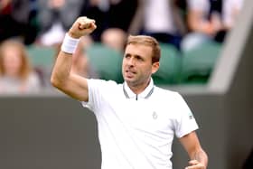 Dan Evans celebrates after winning his gentlemen's singles match against Feliciano Lopez on court 2 on day two of Wimbledon. Picture: Steven Paston/PA Wire