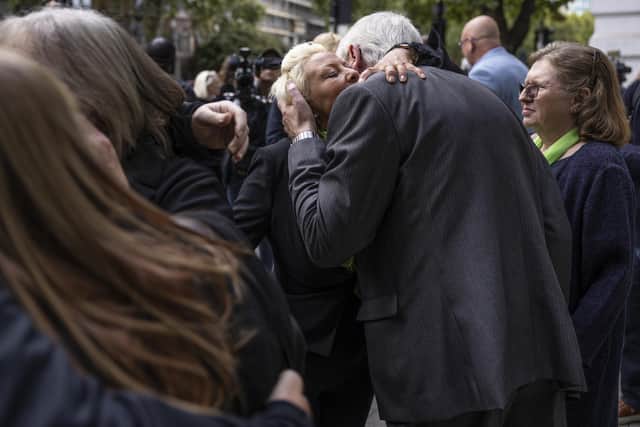 Harry Dunn's mother, Charlotte Charles, is consoled after the family spoke to the media outside the City of Westminster Magistrates Court in London. Picture: Dan Kitwood/Getty Images