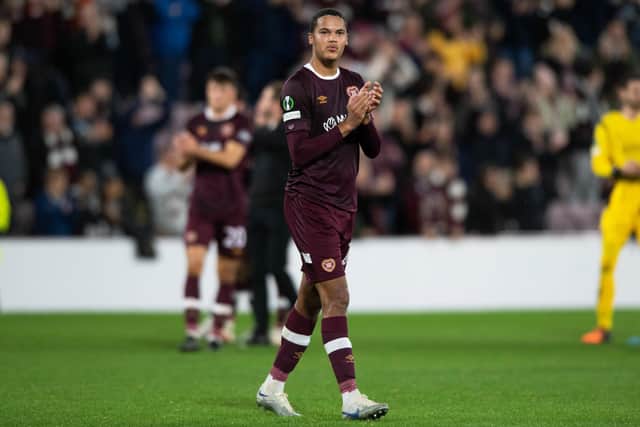 Toby Sibbick takes the applause of the Hearts fans at full time.