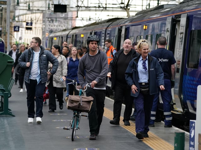 Two trains an hour are running between Glasgow Queen Street and Edinburgh.
Glasgow Central Station was also largely empty with just a few passengers waiting. Picture Andrew Milligan/PA Wire