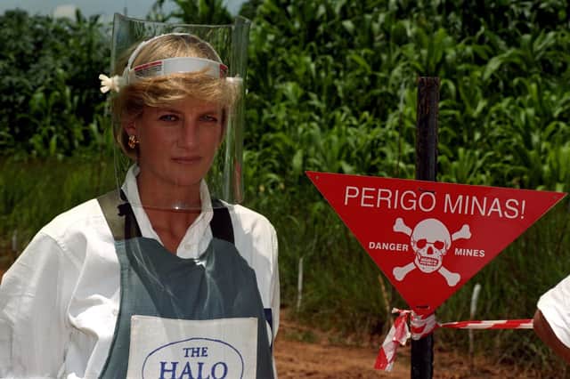 Diana, Princess of Wales, tours a minefield in body armour to see for herself the carnage mines cause, during her visit to Angola. Picture: John Stillwell/PA Wire