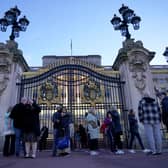 People outside Buckingham Palace in London, after the Princess of Wales revealed she is undergoing chemotherapy treatment for cancer. Photo: Yui Mok/PA Wire