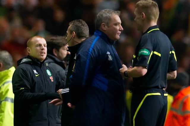Celtic manager Neil Lennon (left) is spoken to by fourth official Iain Brines as Rangers assistant manager Ally McCoist (centre) gets a word from referee Callum Murray during the 2011 Scottish Cup replay at Celtic Park.
