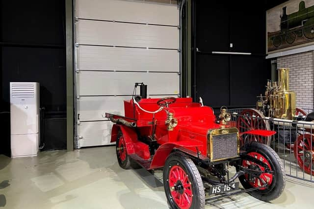 New insulated roller doors and air source heat pump (left) contrast with Scottish built 1907 Albion water pump and fire tender