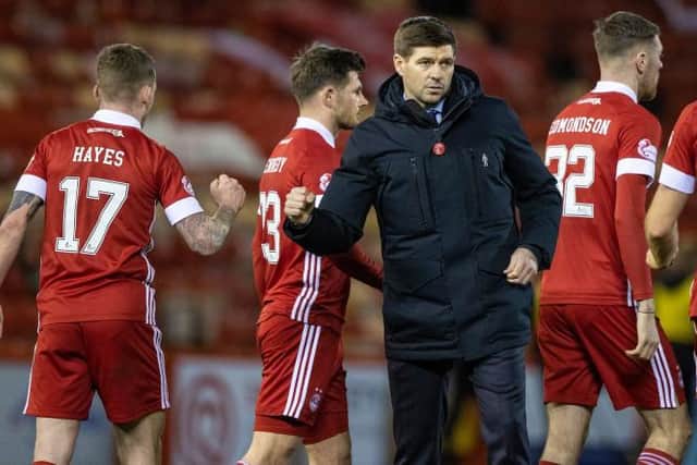 Rangers manager Steven Gerrard (right) with Jonny Hayes at full time during a Scottish Premiership match between Aberdeen and Rangers at Pittodrie, on January 10, 2021, in Aberdeen, Scotland. (Photo by Craig Williamson / SNS Group)