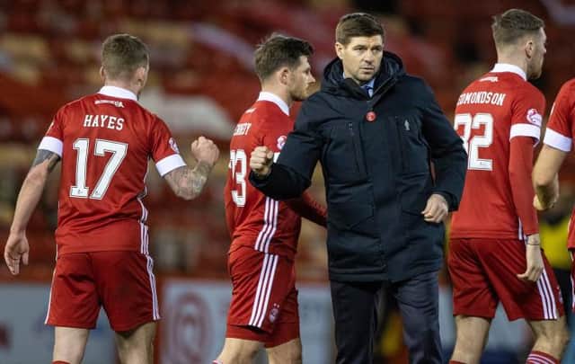 Rangers manager Steven Gerrard (right) with Jonny Hayes at full time during a Scottish Premiership match between Aberdeen and Rangers at Pittodrie, on January 10, 2021, in Aberdeen, Scotland. (Photo by Craig Williamson / SNS Group)