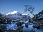 The snow covered peaks of the Three Sisters in Glencoe. Picture: Jane Barlow/PA Wire