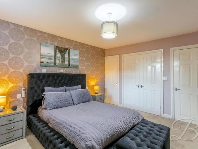 Another shot of the first bedroom, which shows the sizeable fitted wardrobes.