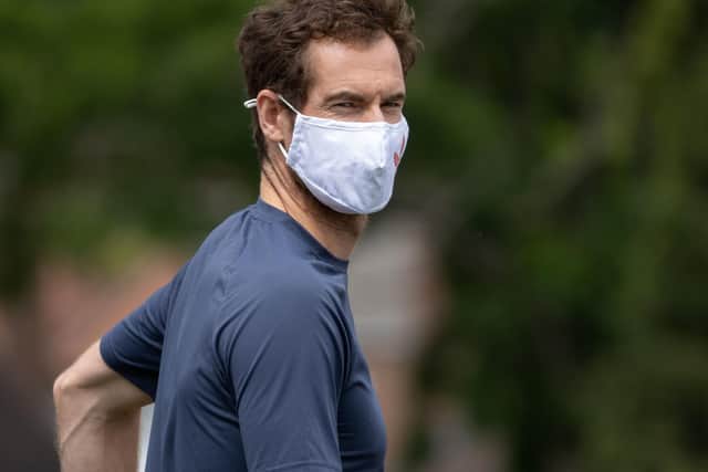 Andy Murray on the practice courts at Wimbledon before today's second-round match