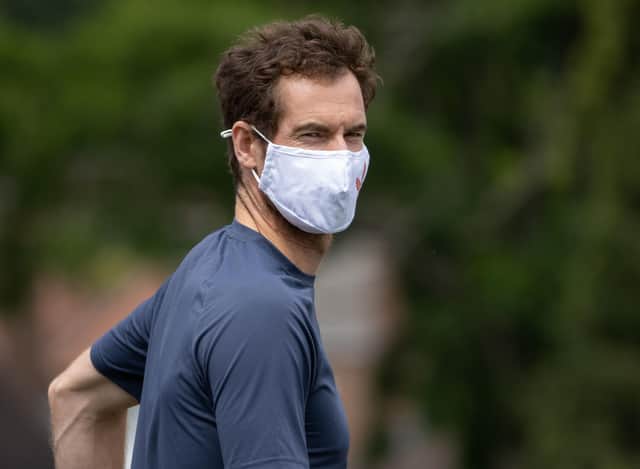 Andy Murray on the practice courts at Wimbledon before today's second-round match