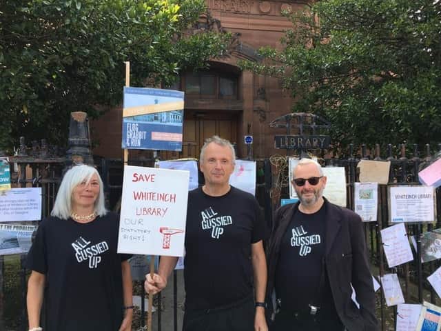 Campaigners: Maureen Cannell, Robert Mellish and local concept artist 'Mavis Banksy" outside Whiteinch Library.