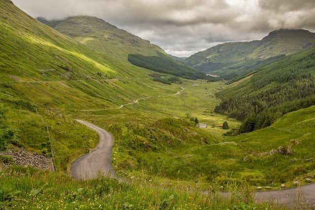 The Old Military Road diversion route, centre, runs parallel to the A83, left, at the Rest and Be .(Photo by John Devlin/The Scotsman)