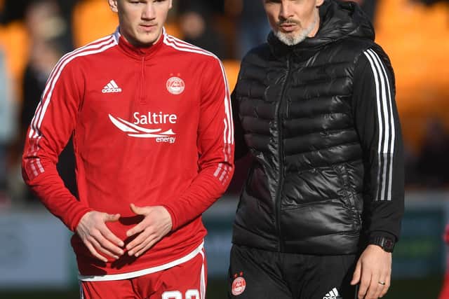 Aberdeen manager Jim Goodwin, pictured with Ramsay back in February.
