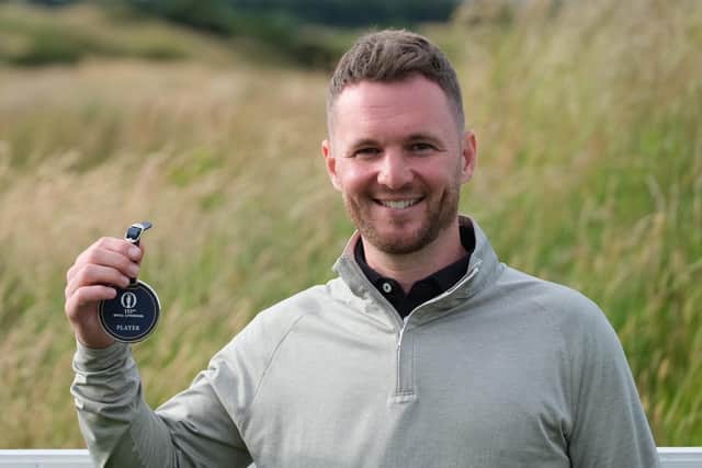 Michael Stewart proudly shows off his player bag tag after securing a spot in the 151st Open after winning the Final Qualifying event at Dundonald Links. Picture: Dundonald Links