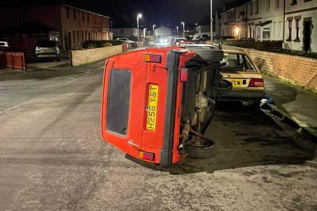 On its side: Reliant Rialto tipped over in Port Seton