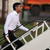 Prime Minister Rishi Sunak boards a plane to travel to the G20 meeting in Bali. Picture: Leon Neal/Pool via AP