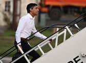 Prime Minister Rishi Sunak boards a plane to travel to the G20 meeting in Bali. Picture: Leon Neal/Pool via AP
