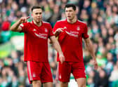 Andy Considine, left, and Scott McKenna in action for Aberdeen.