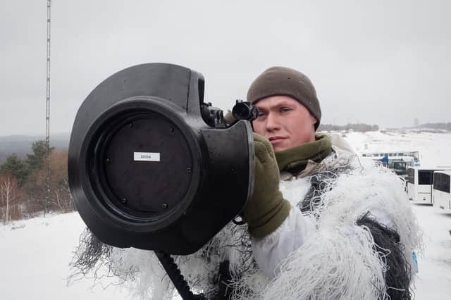 A Ukrainian soldier trains with an anti-tank missile system in Starychi, Ukraine, last weekend amid fears of a Russian invasion (Picture: Gaelle Girbes/Getty Images)
