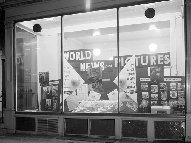 This window of a shop at 118 George Street featured a display of photographs from The Scotsman publicising the work of Post Office Radio in delivering pictures to the newspaper. The picture was taken in November 1961.