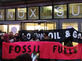 Extinction Rebellion Scotland protesters calling for an end to the fossil fuel industry as they demonstrate outside the Scottish Energy Forum annual dinner at the Edinburgh International Conference Centre.
