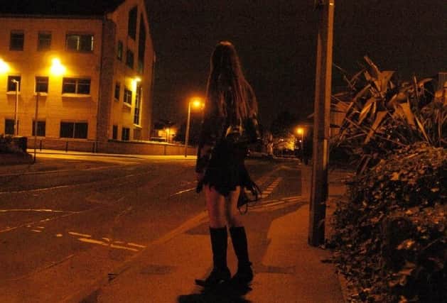 MSPs are to debate calls to shift the criminality of prostitution from the women selling sex and onto the men paying for it.