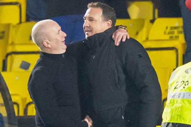 David Martindale and Malky Mackay shake hands at full-time during a cinch Premiership match between Livingston and Ross County at the Tony Macaroni Arena, on December 18, 2021, in Livingston, Scotland.  (Photo by Roddy Scott / SNS Group)