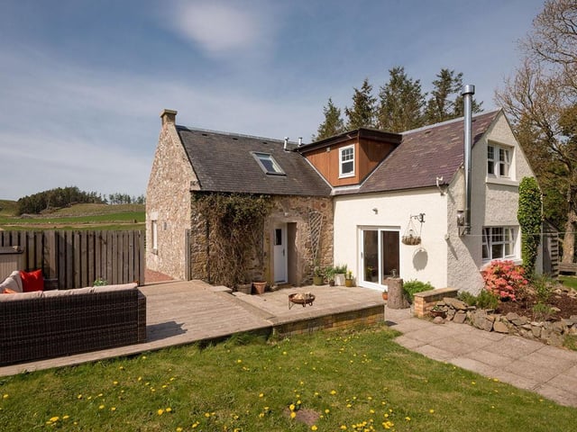 Selling agent: Coulters. Price: Offers over £325,00. Status: Under Offer. Making up the top 5, is this truly rare off-grid cottage surrounded by rolling hills and forest in the heart of East Lothian. ESPC says: “Wanside sits in secluded, expansive gardens with breathtaking views and period character. Inside, spacious rooms, a cosy stove, and countryside-facing windows create a tranquil retreat.”