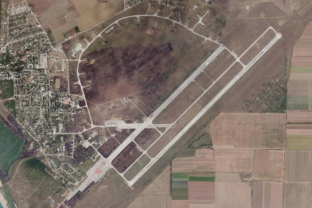 A satellite image by Planet Labs PBC shows Saky Air Base after an explosion there Wednesday, Aug. 10, 2022 woth scorch marks visible and extensive damage.