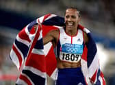 Kelly Holmes celebrating winning the 1500m event at the 2004 Olympics in Athens. Picture: Phil Noble/PA