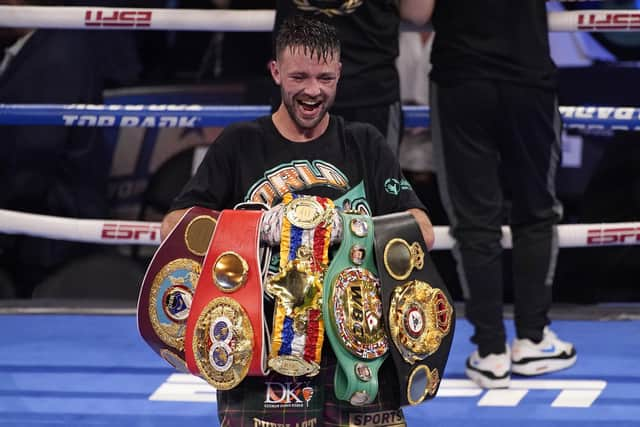 Josh Taylor celebrates with his belts after defeating Jose Ramirez. The Scot returned home but the belts didn't.