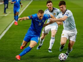 Israel's forward Shon Weissman (L) is marked by Scotland's defender Kieran Tierney (R) during the 2022 FIFA World Cup qualifier group F football match between Israel and Scotland at Bloomfield Stadium. (Photo by JACK GUEZ/AFP via Getty Images)